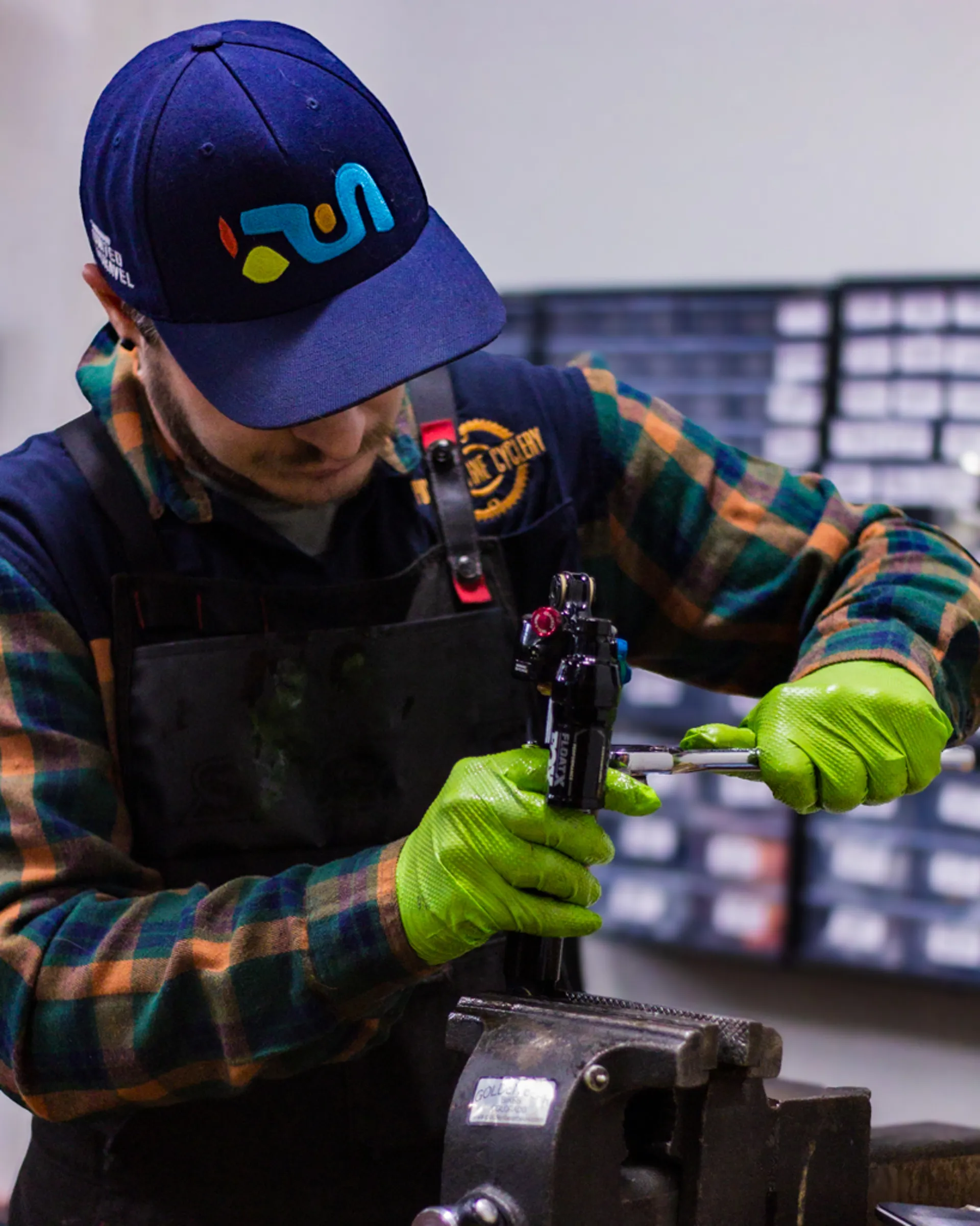 A mechanic working on a bicycle